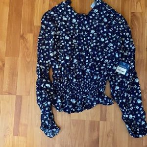 Floral shirt with ruffled bottom